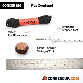 Flat Overhand rig card: the lace, stopper knot and conker laid out beside a ruler.